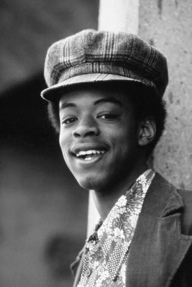 A photo by John H White of a high school age student at the Robert Taylor Homes highrise apartment complex circa 1973